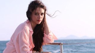 Woman boat water hair wind 2 - the wind free wallpaper