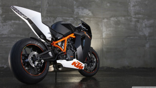 Motorcycle parked wall ktm logo 2 - a wall free wallpaper