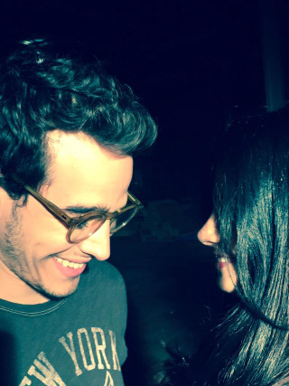 Smiling man woman eye contact - they free wallpaper for mobile