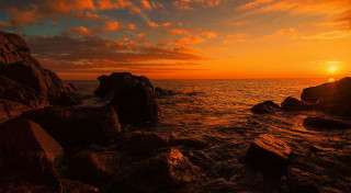 Sunset ocean rocks water orange 6 - orange sky above free wallpaper