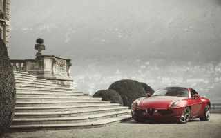 Red sports car stone staircase - a hill side free wallpaper for desktop