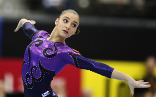 Gymnastics arabesque purple leotard beam - full round face free wallpaper