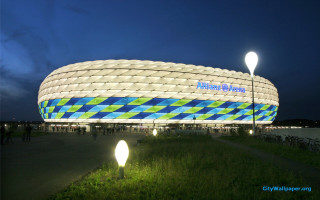 Large building blue green night - modernism free wallpaper