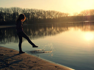 Woman beach water sunset sunrise - a beach next free wallpaper