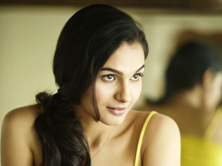 Woman yellow top serious look - a yellow top free wallpaper