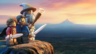 Lego man woman rock sword - top of a rock free wallpaper