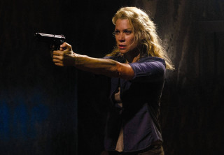 Woman holding gun dark room 5 - a dark room free wallpaper