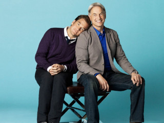 Two men sitting chair posing - the chair free wallpaper