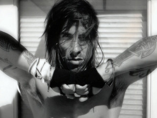 Man tattoos gun serious look - anthony angarola free wallpaper