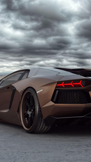 Brown sports car cloudy sky - free cars wallpaper for mobile