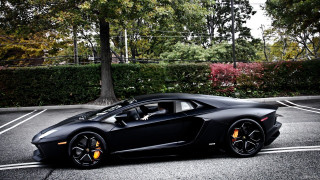 Black sports car parking lot 36 - daarken free wallpaper