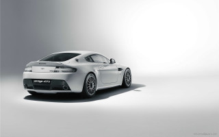 White sports car studio setting - a white sports car free wallpaper