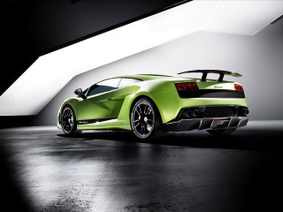 Green sports car dark room 9 - a green sports car free wallpaper