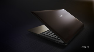 Laptop table black background gold - a laptop computer free wallpaper for desktop