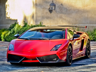 Red sports car building light - a red sports car free wallpaper