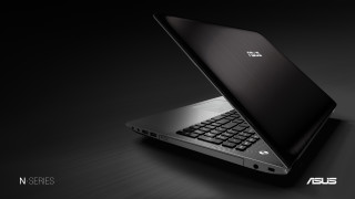 Laptop table black background silver - a laptop computer free wallpaper