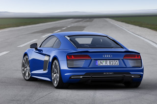 Blue car driving road grass 2 - a blue car free wallpaper