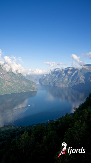 Lake mountains clouds boat water - free landscape wallpaper for mobile