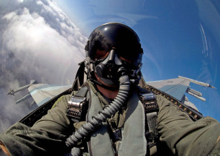 Fighter jet flying sky helmet - selfie free wallpaper