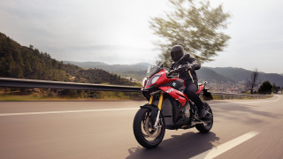 Motorcycle ride forest mountains background - a person riding free wallpaper