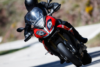 Person riding motorcycle road helmet - the back of the motorcycle free wallpaper