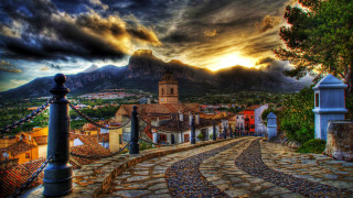 Cobblestone road church village mountains - mountain free wallpaper for desktop