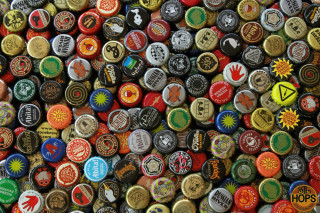 Beer bottle caps pile stacked - 2 d sprite free wallpaper