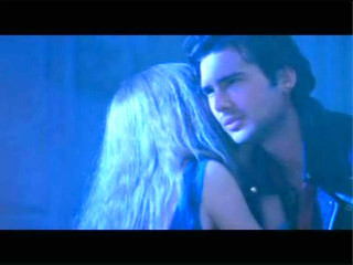 Man woman blue room blue - a blue light behind them free wallpaper