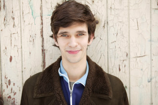 Man jacket blue shirt smiling - painted free wallpaper