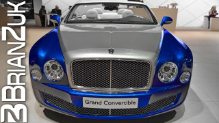 Blue silver showroom car people - the background and a sign free wallpaper