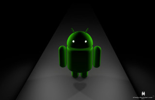Green android character dark spotlight - a black background and a spotlight free wallpaper