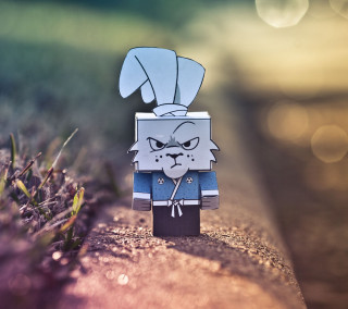 Paper toy cat hat cigarette - a tilt shift photo free wallpaper for tablet