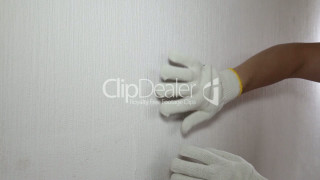 Person white gloves painting wall - white paint free wallpaper