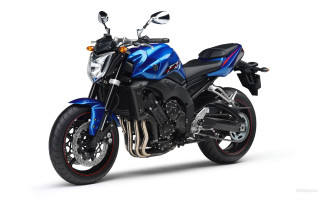 Blue motorcycle white surface black - a blue motorcycle free wallpaper