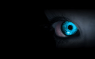 Blue eye black background repeated - a blue eye free wallpaper