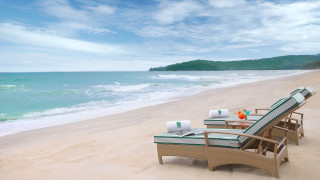 Bascove beach ocean lighthouse scenery - a chair and a table free wallpaper