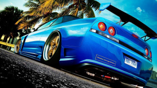 Blue car palm trees surfboard - a blue car free wallpaper