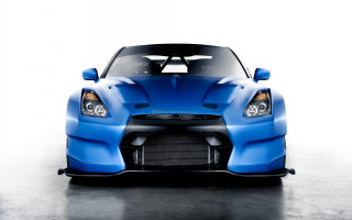 Blue sports car black hood - a white room free wallpaper for desktop