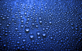 Water droplets blue surface city - a blue surface free wallpaper