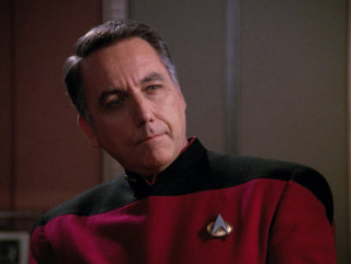 Man red uniform serious look - a red uniform free wallpaper