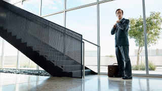 Man standing staircase building suitcase - turnaround free wallpaper