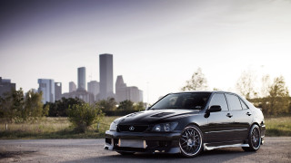 Black car parking lot city 3 - a black car free wallpaper