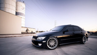 Black car parking lot building 5 - andrew bell free wallpaper