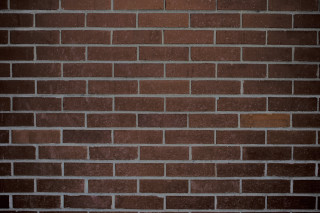 Red brick wall white clock 3 - a red brick wall free wallpaper