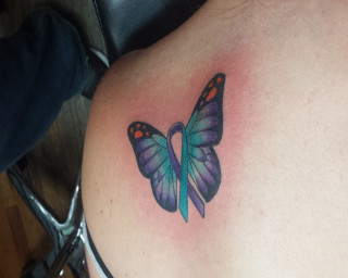 Butterfly tattoo woman shoulder chest - back view free wallpaper