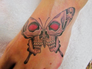 Butterfly skull tattoo image design - foot free wallpaper