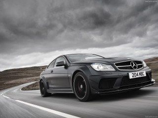 Mercedes c6 amg driving road - a road under a cloudy sky free wallpaper