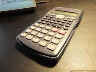 Calculator laptop table black surface - free technology wallpaper for desktop