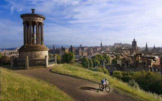 Man riding bike dirt road 3 - david begbie free wallpaper