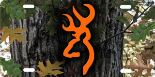 Metal sign deer leaves tree - a tree trunk free wallpaper